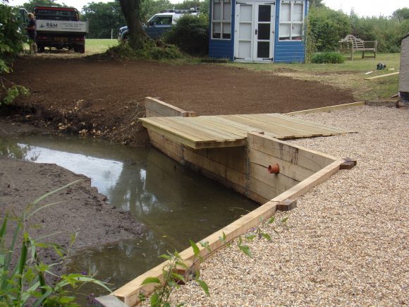 DAMAGED POND BANK REPAIRED IN SUFFOLK
