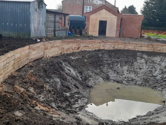 POND DREDGING AND OAK RETAINING WALL PROJECT